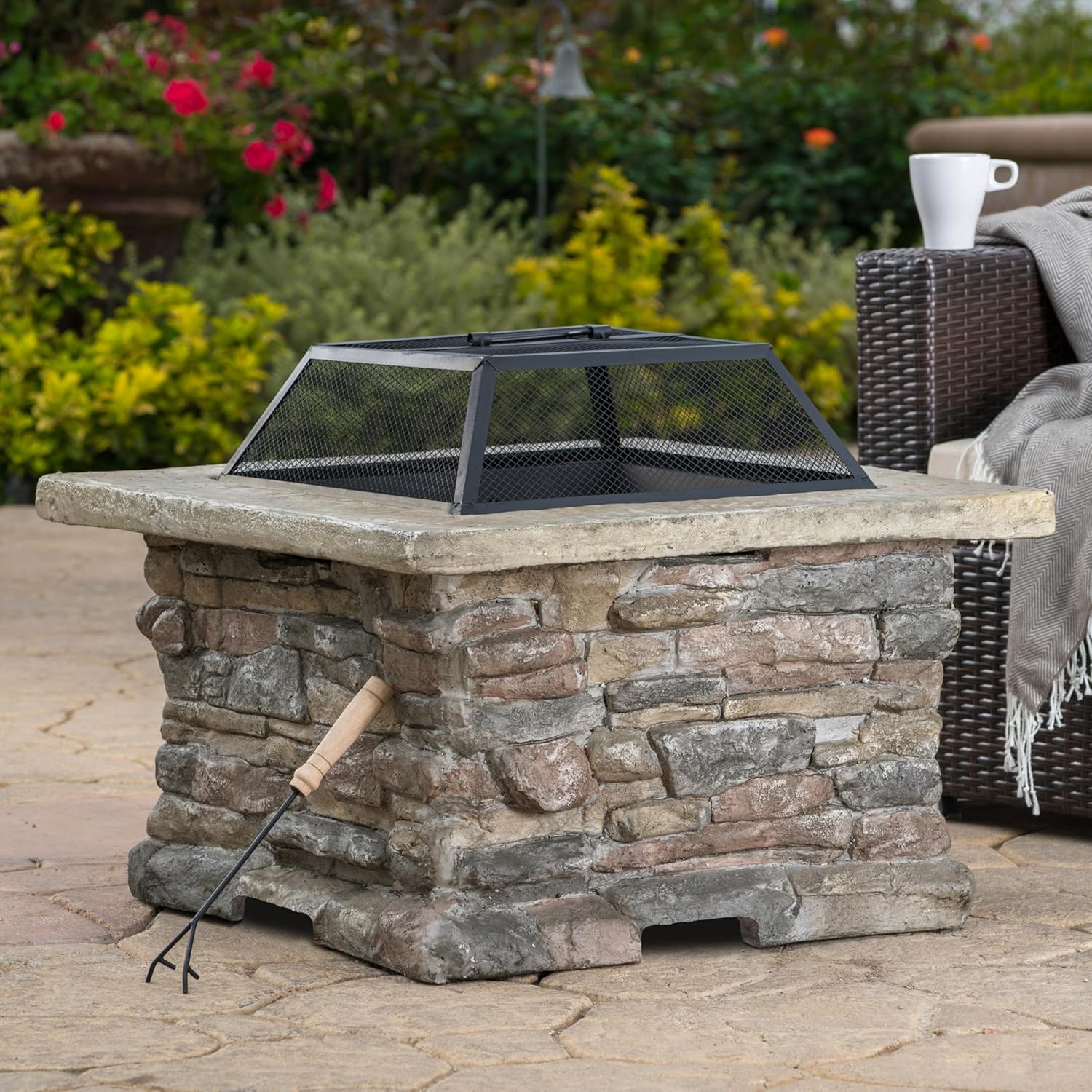 28 Inch Outdoor Wood Burning Fire Pit with Lid Natural Stone Base Heat Resistant Iron Bowl Elegant Design Complete Set Includes Mesh Cover and Poker Tool No Assembly Required for Backyard Patio Use